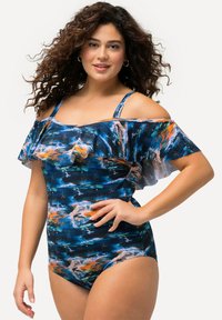 Maillot de bain abstrait bleu et multicolore avec design décolleté, manches volantées et tissu extensible pour le confort.