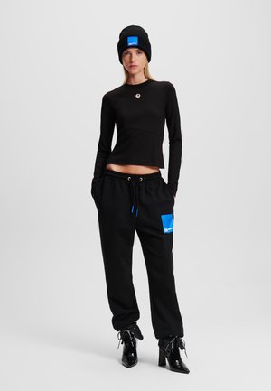RELAXED SWEAT - Treningo apatinė dalis - black