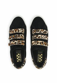 Black velour sneakers with three leopard-print Velcro straps, flat white rubber soles, and a branded insole featuring a checkered design.