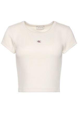 T-shirt bianca corta a maniche corte in tessuto coste, con scollo rotondo e piccola toppa con il logo Calvin Klein Jeans sul petto.