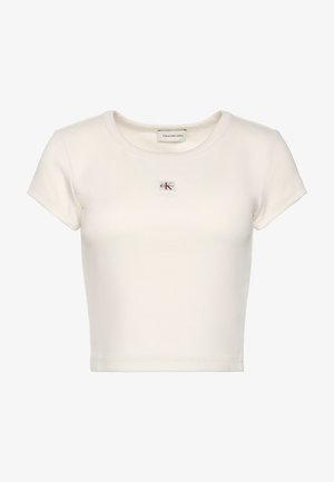 T-shirt bianca corta a maniche corte in tessuto coste, con scollo rotondo e piccola toppa con il logo Calvin Klein Jeans sul petto.