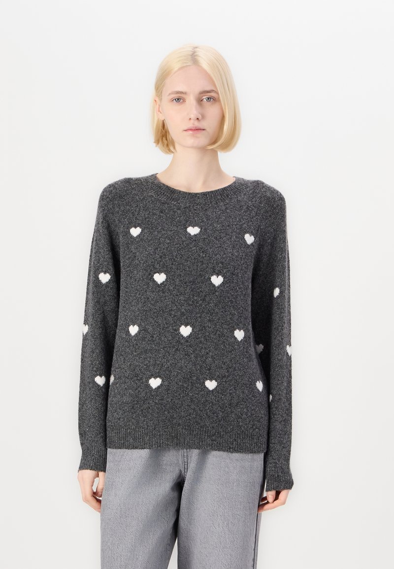Gray knitted sweater with white heart patterns, round neckline, long sleeves, and ribbed hem. Smooth texture with a relaxed fit.