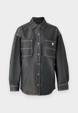 Dark denim shirt with long sleeves, button front, pointed collar, two large chest pockets, and white contrasting stitching.