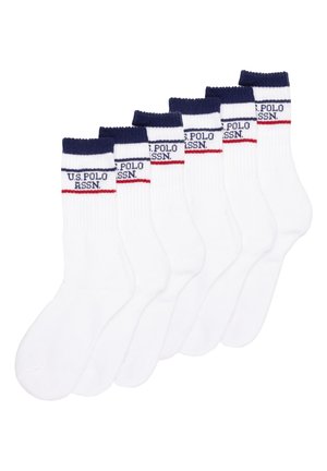 Calze sportive bianche in cotone con polsini a coste blu navy. Ogni calza presenta una striscia rossa e blu navy e il logo "U.S. POLO ASSN.". Set di sei.