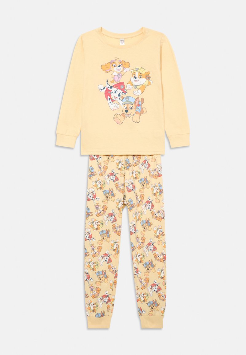 Gul langærmet pyjamasbluse med tryk af tegneseriehund, parret med matchende bukser med et all-over hundemønster. Blødt bomuldsstof.