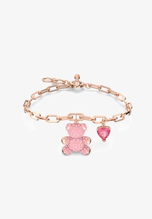 Ruusukultainen rannekoru, jossa on linkitetty ketjumuotoilu, koristeltuna pinkillä teddy-karhulla ja pinkillä sydämellä, molemmissa säihkettä.