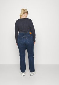 Levi's® Plus 724™ PL HR STRAIGHT - Calças de ganga de perna direita - blue denim