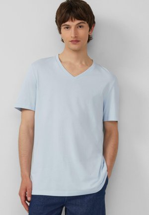 Lichtblauwe V-hals T-shirt van zachte stof, met korte mouwen en een relaxte pasvorm. Heeft subtiele logo-details op de borst.