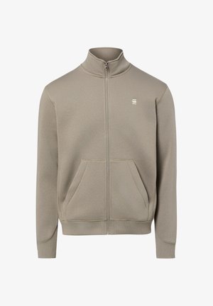 Beige Sweatshirt mit Reißverschluss, hohem Kragen, zwei Fronttaschen, gerippten Bündchen und Saum sowie kleinem Logo auf der linken Brust.