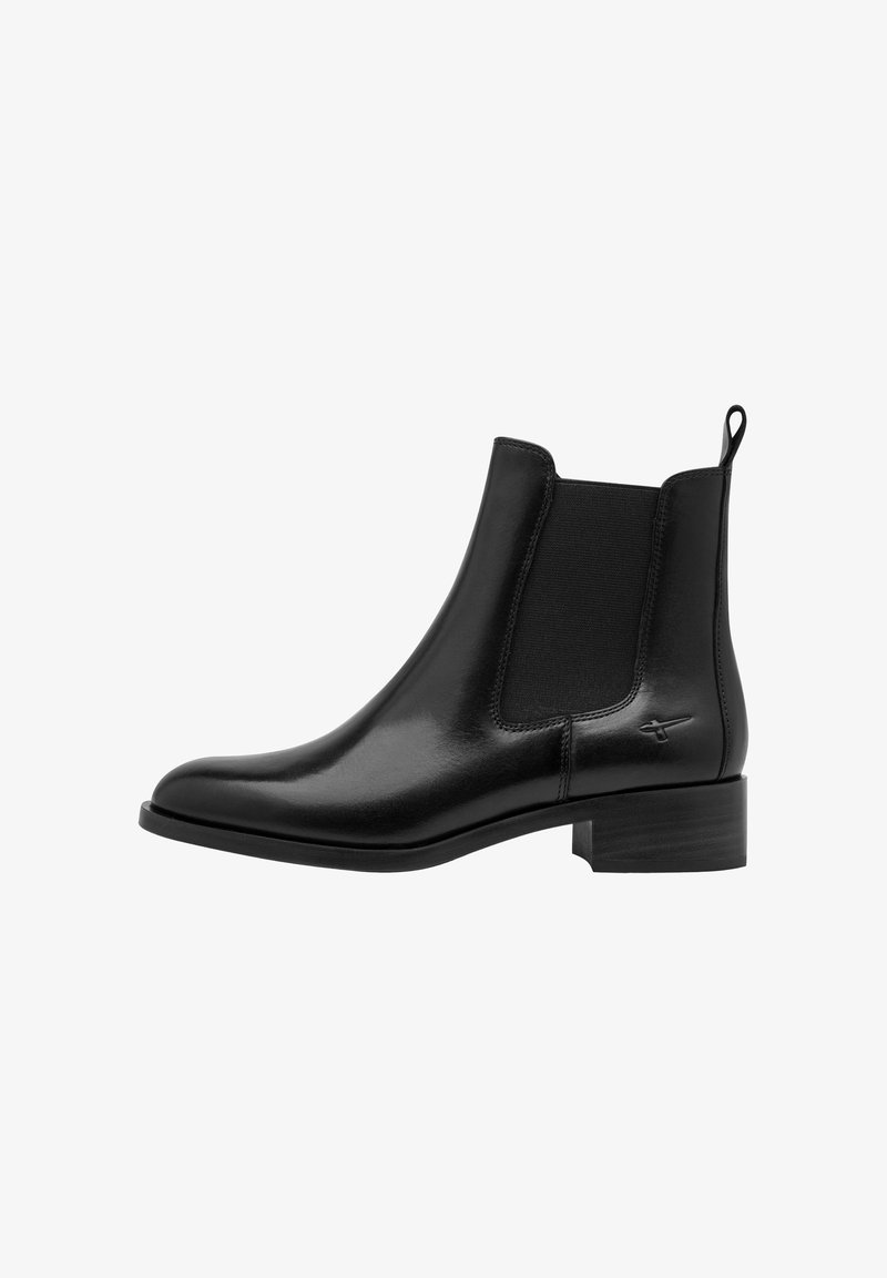 Μαύρο δερμάτινο ankle boot Chelsea με χαμηλό τακούνι block, ελαστικές πλαϊνές επενδύσεις και ταινία για τράβηγμα στο πίσω μέρος.