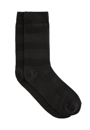 Schwarz gestreifte Socken mit glatter Textur, geripptem Bund und durchgehend einfarbig. Entwickelt für Komfort und den täglichen Gebrauch.