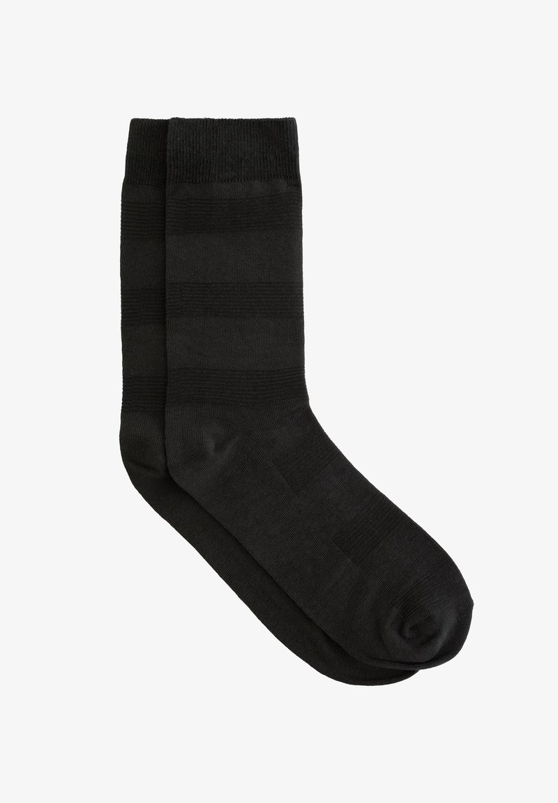 Fekete csíkos zoknik sima textúrával, bordás felső résszel és egységes színnel. Kényelmes és mindennapi viseletre tervezték.