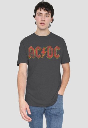 Gray cotton t-shirt featuring a bold red and yellow AC/DC graphic logo, short sleeves, and a relaxed fit, front design centered.