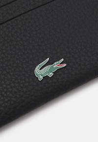 Lacoste HOLDER - Punge - noir