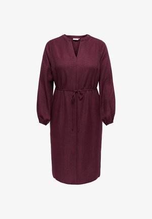 Burgundské dlouhé šaty s výstřihem do V, s páskem v oblasti pasu a nařasenými manžetami. Vyrobené z texturované látky, mají volný střih.