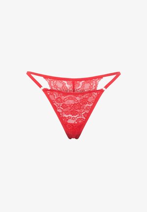 Tanga de encaje rojo con patrones florales transparentes, lados estrechos y tirantes ajustables. Cuenta con una cintura sólida en rojo y detalles delicados de ribete.