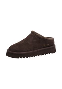 Zapato de ante marrón sin cordones con forro de forro polar, punta redondeada y una suela gruesa y serrada. Presenta un sutil logotipo de la marca en el lateral.