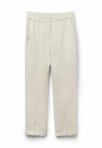 Beiga linnebyxor med elastisk midja, som har sidofickor, knäppning med knapp och en avsmalnande benmodell. Rakt fram med veck.