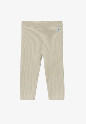 Beige gerippte Leggings mit einer weichen Textur, ausgestattet mit einem elastischen Bund und einem kleinen Logo-Tag auf der oberen linken Seite.