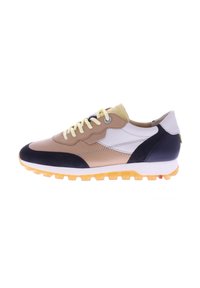 Sneakers with a mix of light brown, navy, and white leather, textured suede, yellow laces, and a thick, ridged yellow sole.