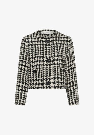 Mustvalge lühike jakk, millel on houndstooth muster, valmistatud tekstureeritud kangast, nelja musta nööbiga ja ümarate kaelustega.