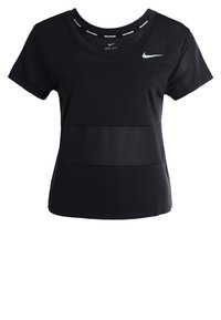 Camiseta de manga corta Dri-FIT negra con paneles de malla texturizada y acentos lisos. Presenta un escote redondeado y un detalle del logo en el pecho.