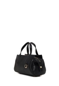 Black leather handbag with dual handles, gold ring detail, and top zipper closure, shown against white background.