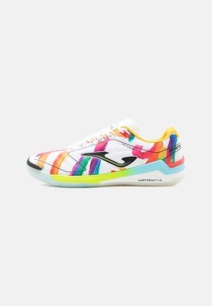 Low-top sports shoe with white base, multicolored brushstroke patterns, black logo on side, yellow inner lining, and neon green and blue sole accents.