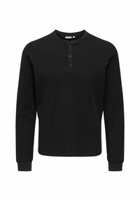 Sort langærmet henley-shirt lavet af tekstureret stof med tre-knaps placket, rund hals og tætsiddende manchetter.