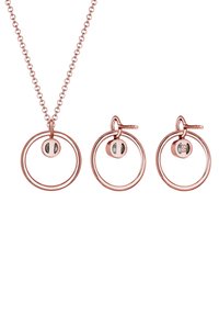 Smyckeset i roséguld som innehåller ett halsband och två örhängen. Varje del har cirkulära ringar med en liten sfärisk accent i mitten.
