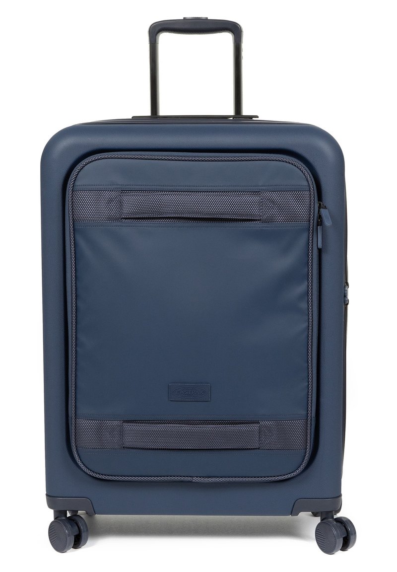 Valigia rigida blu navy con finitura strutturata, tasca anteriore con zip, manico telescopico e quattro ruote per una facile mobilità.