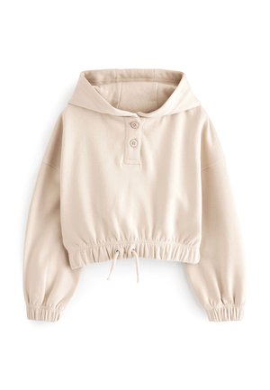 Sweat à capuche court beige avec manches longues, poignets élastiques, deux boutons au col et cordon ajustable à l'ourlet.