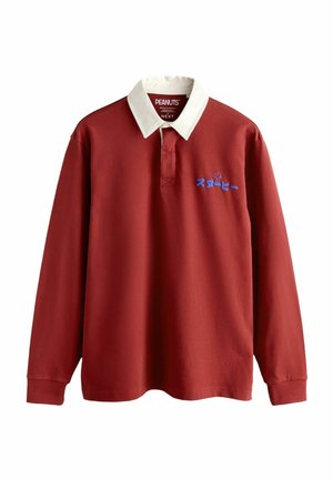 Långärmad röd rugbytröja med vit krage, blå japansk text och en liten Snoopy-grafik på vänster bröst.