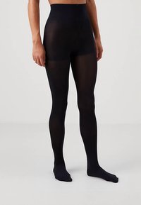 Zwarte ondoorzichtige panty's met een hoge tailleband, een gladde textuur en een rekbaar materiaal, die de hele benen bedekken.