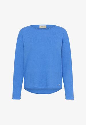 Zils garām piedurknēm tops no mīksta auduma, ar apaļu izgriezumu, brīvu piegriezumu un nelielu logotipa detaļu uz apakšmala.