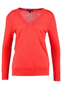 Pull rouge à manches longues avec col en V, poignets et ourlet côtelés, en tissu tricoté léger, taille petite.