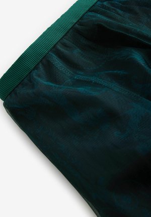 Dunkelgrüne Mesh-Shorts mit strukturiertem Bund und dezentem Musterdesign, die einen leichten und atmungsaktiven Stoff präsentieren.