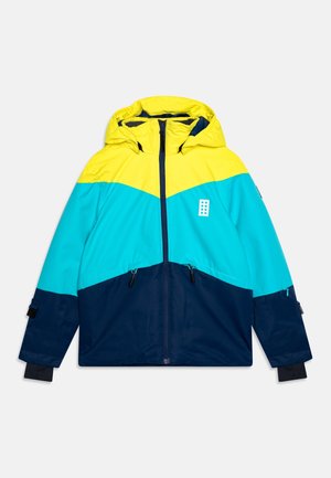 Kapuzensweatjacke mit Farbblöcken in Gelb, Türkis und Marineblau, Frontreißverschluss, zwei Reißverschlusstaschen und langen Ärmeln mit schwarzen Bündchen.