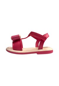 Sandali sintetici rosa con suola piatta, cinturini regolabili e un accento testurizzato. Presentano materiale rosa con finitura liscia e una soletta di colore chiaro.