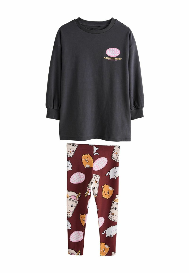 Black long-sleeve top with "BUBBLE" graphic and maroon leggings featuring playful cat and drink patterns. Made of soft cotton fabric.
