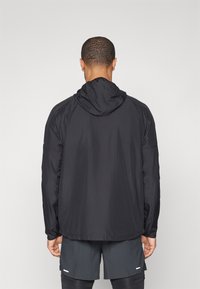 Nike Performance Windbreakers - black