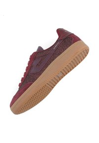 Burgundy sneakers featuring a textured upper with glitter accents, lace-up design, and a gum rubber outsole with a patterned tread.