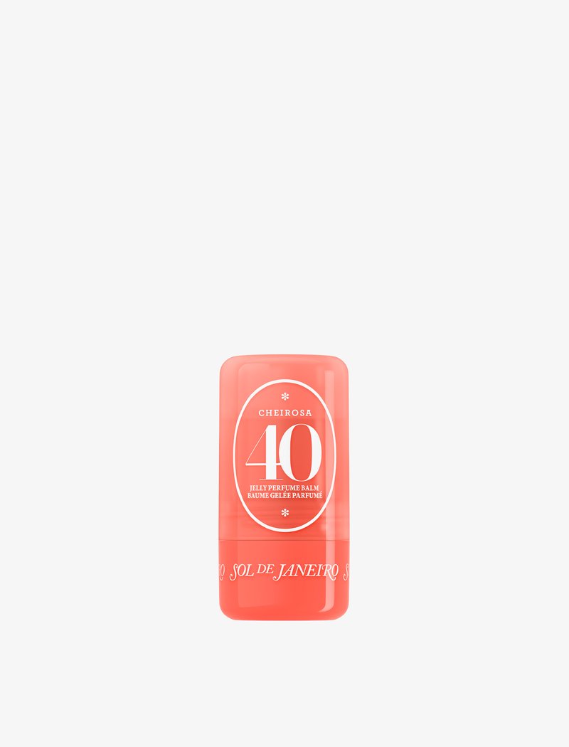 Stick baume parfum gelée couleur corail, étiqueté « Cheirosa 40 » et « Sol de Janeiro » sur fond blanc.