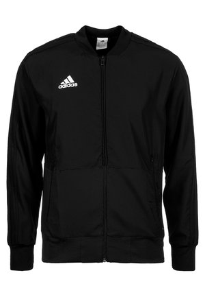 Veste zippée noire Adidas avec poignets et col côtelés, logo Adidas sur la poitrine gauche et détails discrets de rayures sur les manches.
