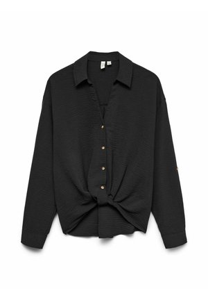 Blouse noire à col avec une finition texturée, dotée d'un détail noué à la taille et de boutons dorés sur le devant. Manches longues.