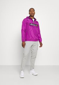 Ellesse Pinzolo W veste de survêtement lilac Ellesse Pinzolo W veste de survêtement lilac