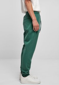 Starter ESSENTIAL  - Pantalones deportivos - darkfreshgreen