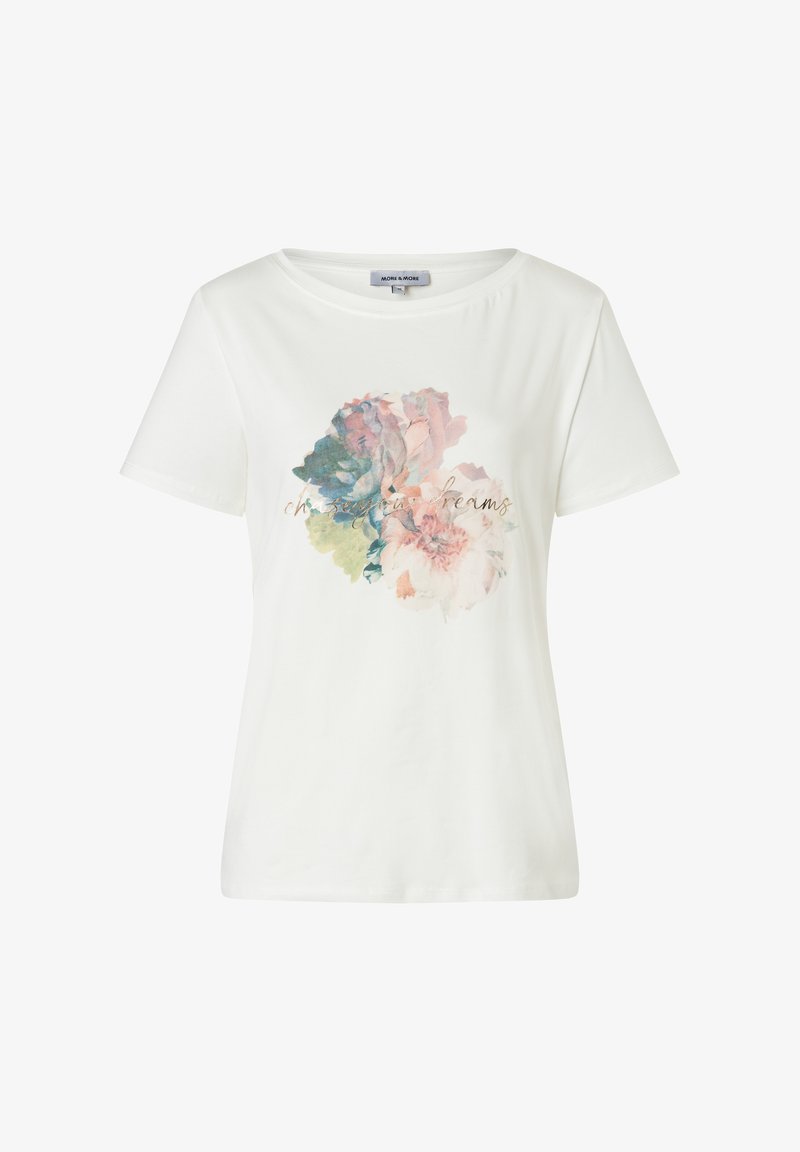 Weißes Baumwoll-T-Shirt mit kurzen Ärmeln, das ein florales Design in Pastellfarben und den Text "deinen Träumen nachjagen" in Gold zeigt.