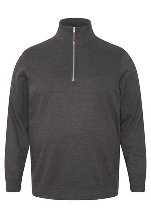 Dunkelgrauer Pullover aus weichem Stoff. Besitzt einen halben Reißverschluss an der Vorderseite, einen hohen Kragen und ein kleines Lederakzent am Saum. Einfaches Design.