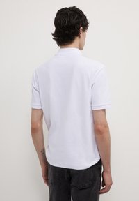 Calliope OPERATO  - Polo - bianco